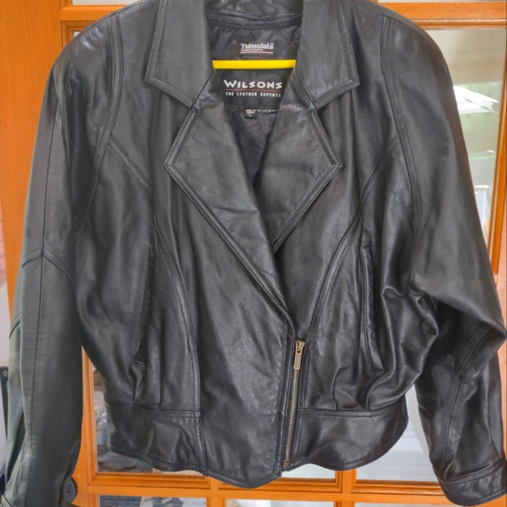 Women's cropped Wilson's leather jacket with removable liner.